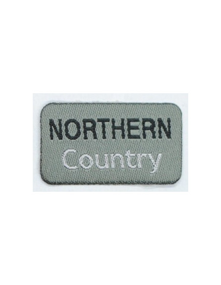 Tygmärke "northern Conuntry" grå